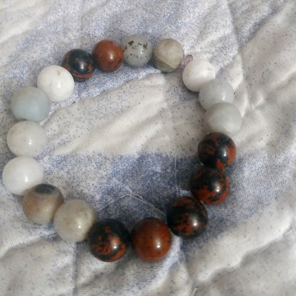 7 Chakra Bracelet with mica inclusions in each 10mm bead.